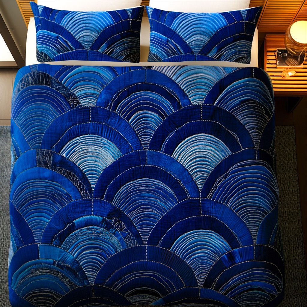 Velvet Arcs quilted 3-piece bedding set on a made bed with two matching pillow shams