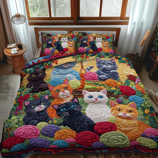 Vibrant Cats And Yarn quilted 3-piece bedding set on a made bed with two matching pillow shams