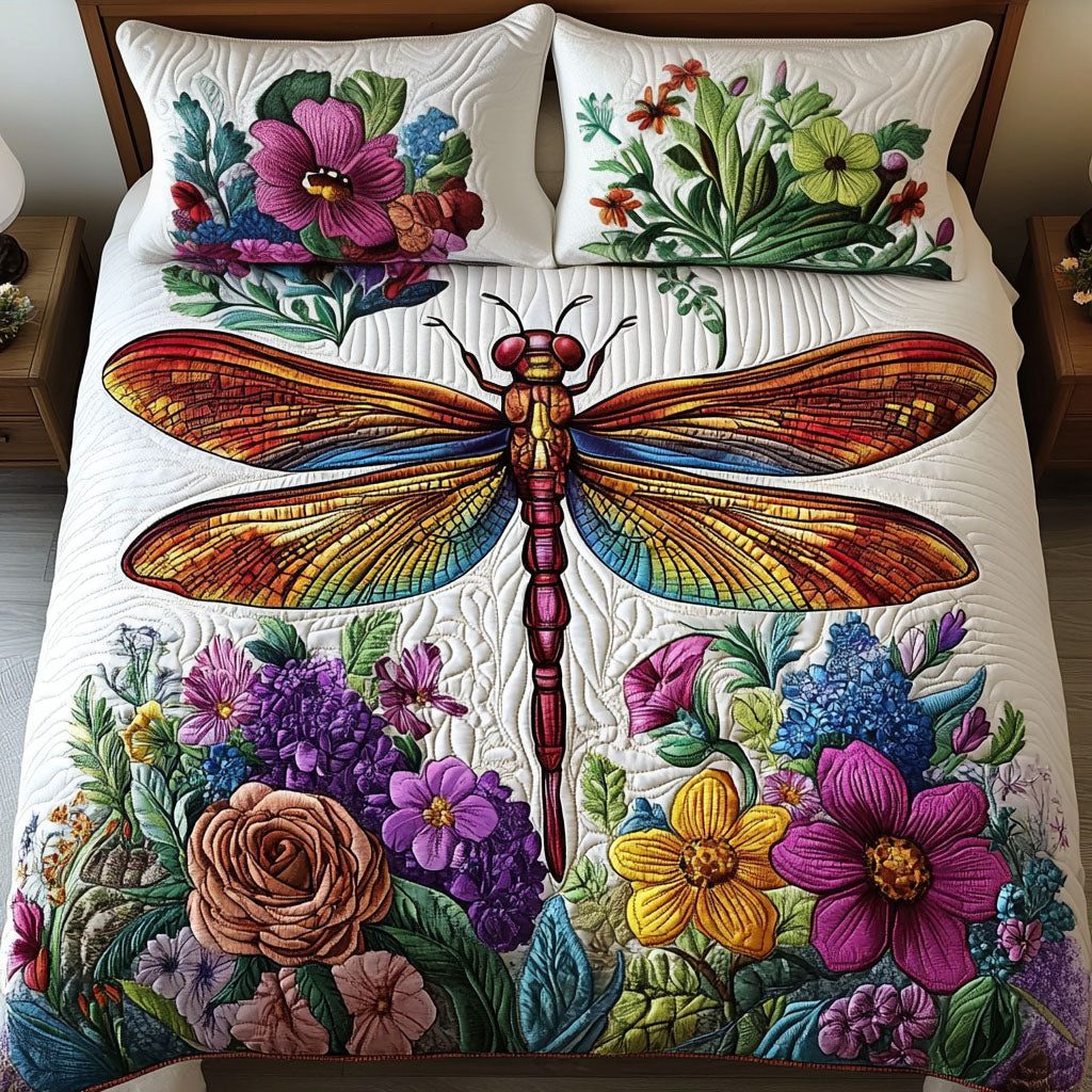 Vibrant Dragonfly quilted 3-piece bedding set on a made bed with two matching pillow shams