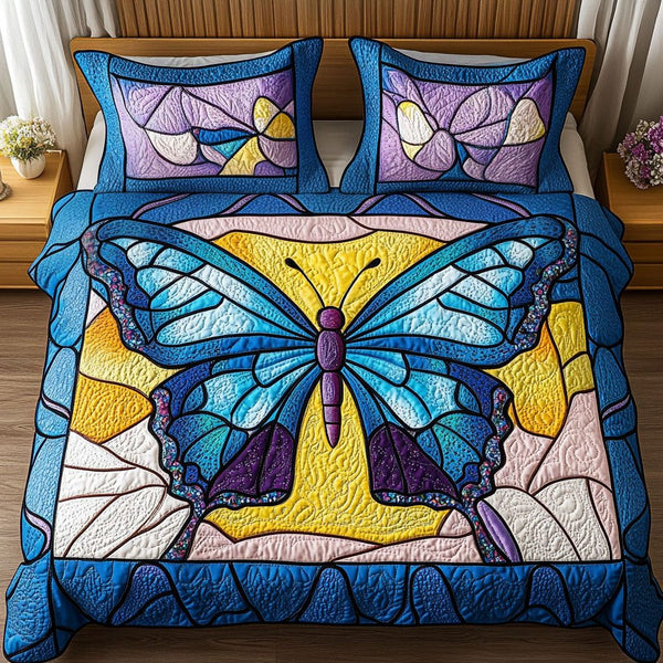 Vibrant Flutter quilted 3-piece bedding set on a made bed with two matching pillow shams