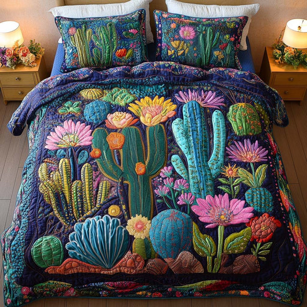 Vibrant Garden quilted 3-piece bedding set on a made bed with two matching pillow shams