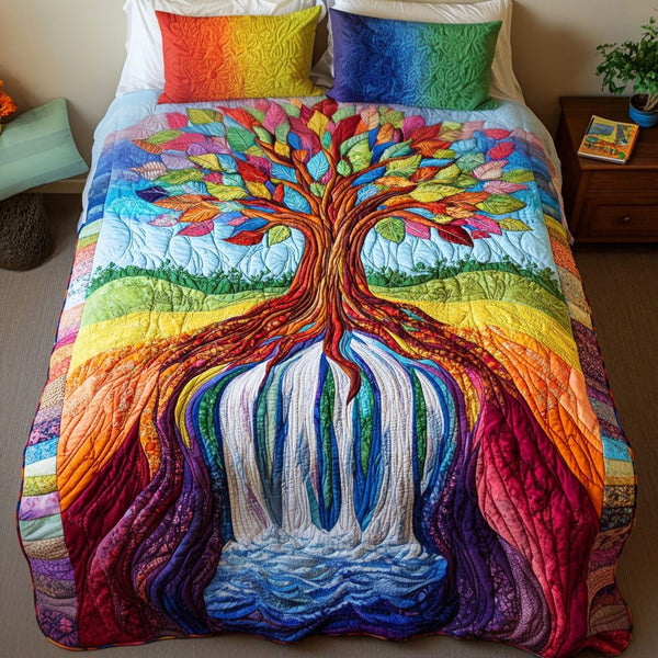Vibrant Roots Cascade quilted 3-piece bedding set on a made bed with two matching pillow shams