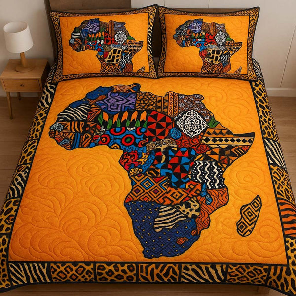 Vibrant Tribal Map quilted 3-piece bedding set on a made bed with two matching pillow shams