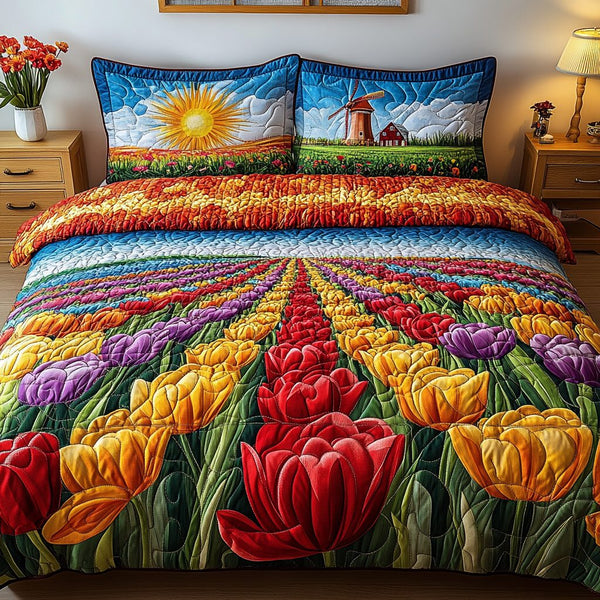 Vibrant Tulips quilted 3-piece bedding set on a made bed with two matching pillow shams