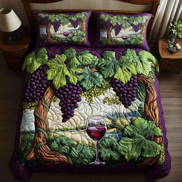 Vineyard Dreams quilted 3-piece bedding set on a made bed with two matching pillow shams