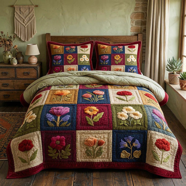 Vintage Blooms quilted 3-piece bedding set on a made bed in a farmhouse bedroom