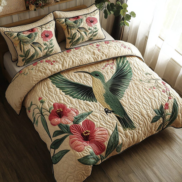 Vintage Hummingbird Charm quilted 3-piece bedding set on a made bed in a farmhouse bedroom