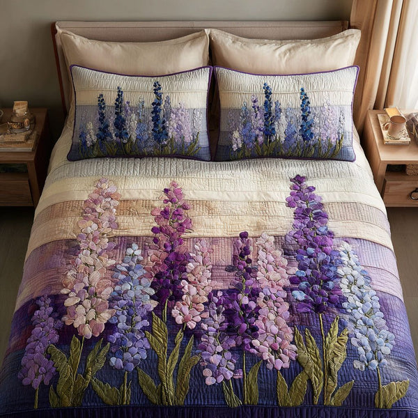 Violet Field quilted 3-piece bedding set on a made bed with two matching pillow shams