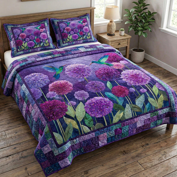 Violet Meadow quilted 3-piece bedding set on a made bed with two matching pillow shams