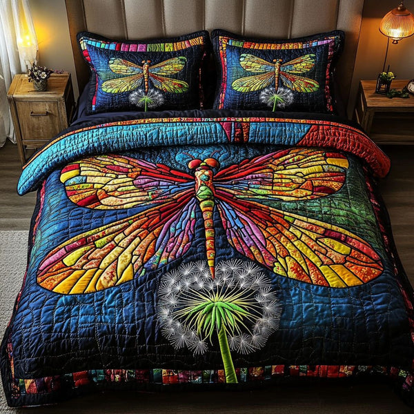 Vivid Dragonfly quilted 3-piece bedding set on a made bed with two matching pillow shams