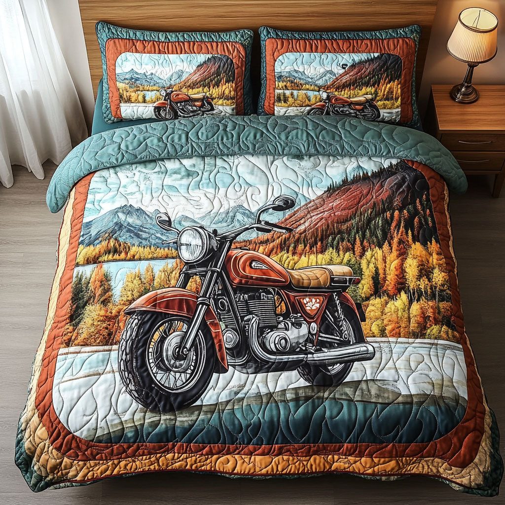 Vroom and Voyage quilted 3-piece bedding set on a made bed with two matching pillow shams