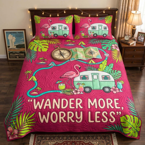 Wander Caravan quilted 3-piece bedding set on a made bed with two matching pillow shams