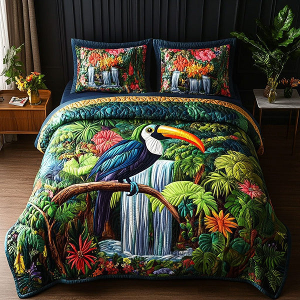 Waterfall Paradise quilted 3-piece bedding set on a made bed with two matching pillow shams