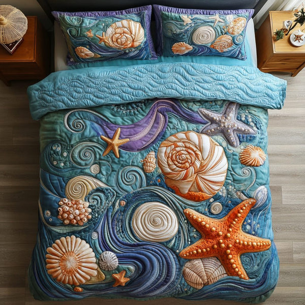 Wave Harmony quilted 3-piece bedding set on a made bed in a light coastal bedroom