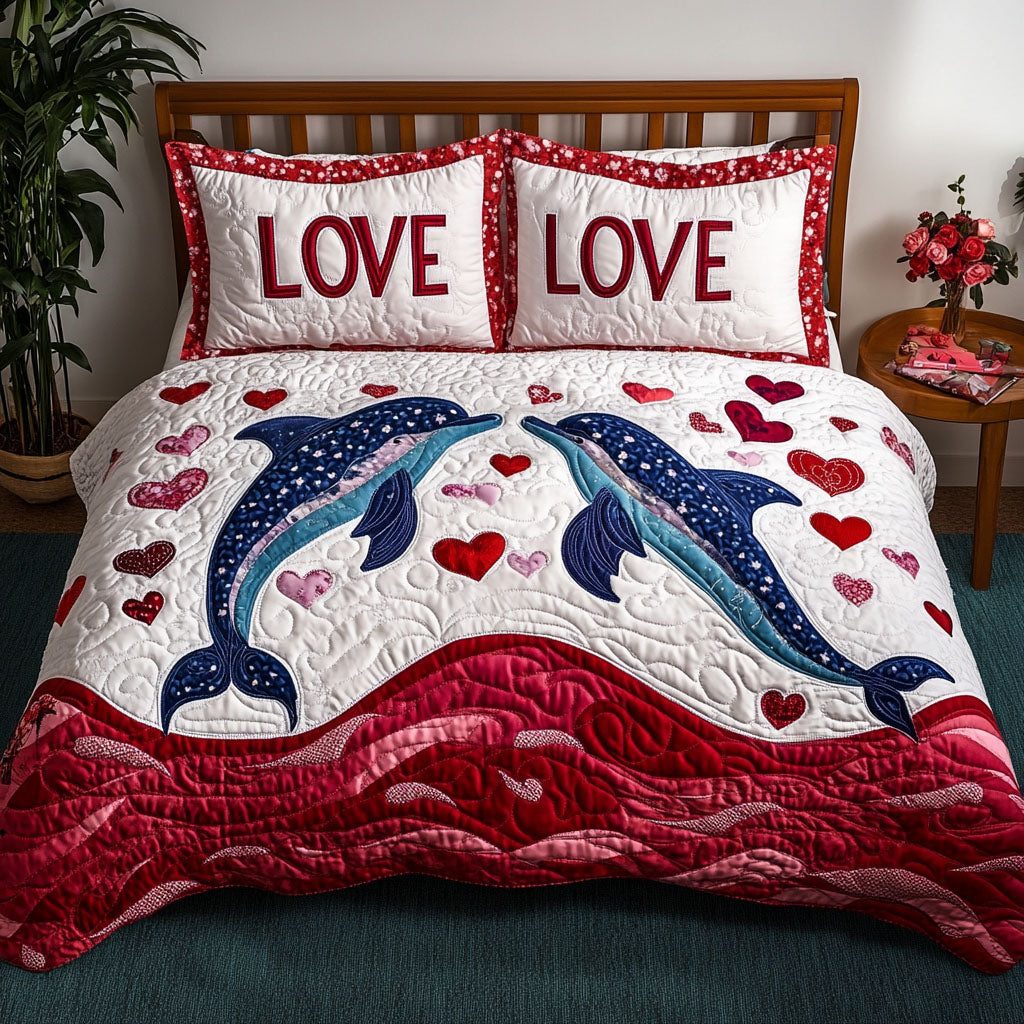 Wave of Love quilted 3-piece bedding set on a made bed in a light coastal bedroom