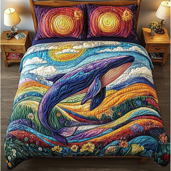 Whale Magic quilted 3-piece bedding set on a made bed in a light coastal bedroom