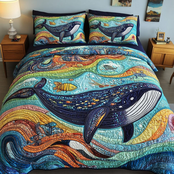 Whale Song quilted 3-piece bedding set on a made bed in a light coastal bedroom