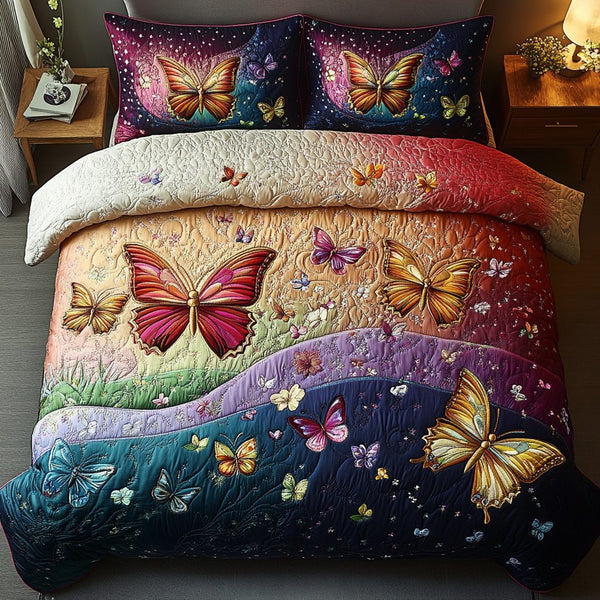 Whimsical Flight quilted 3-piece bedding set on a made bed with two matching pillow shams