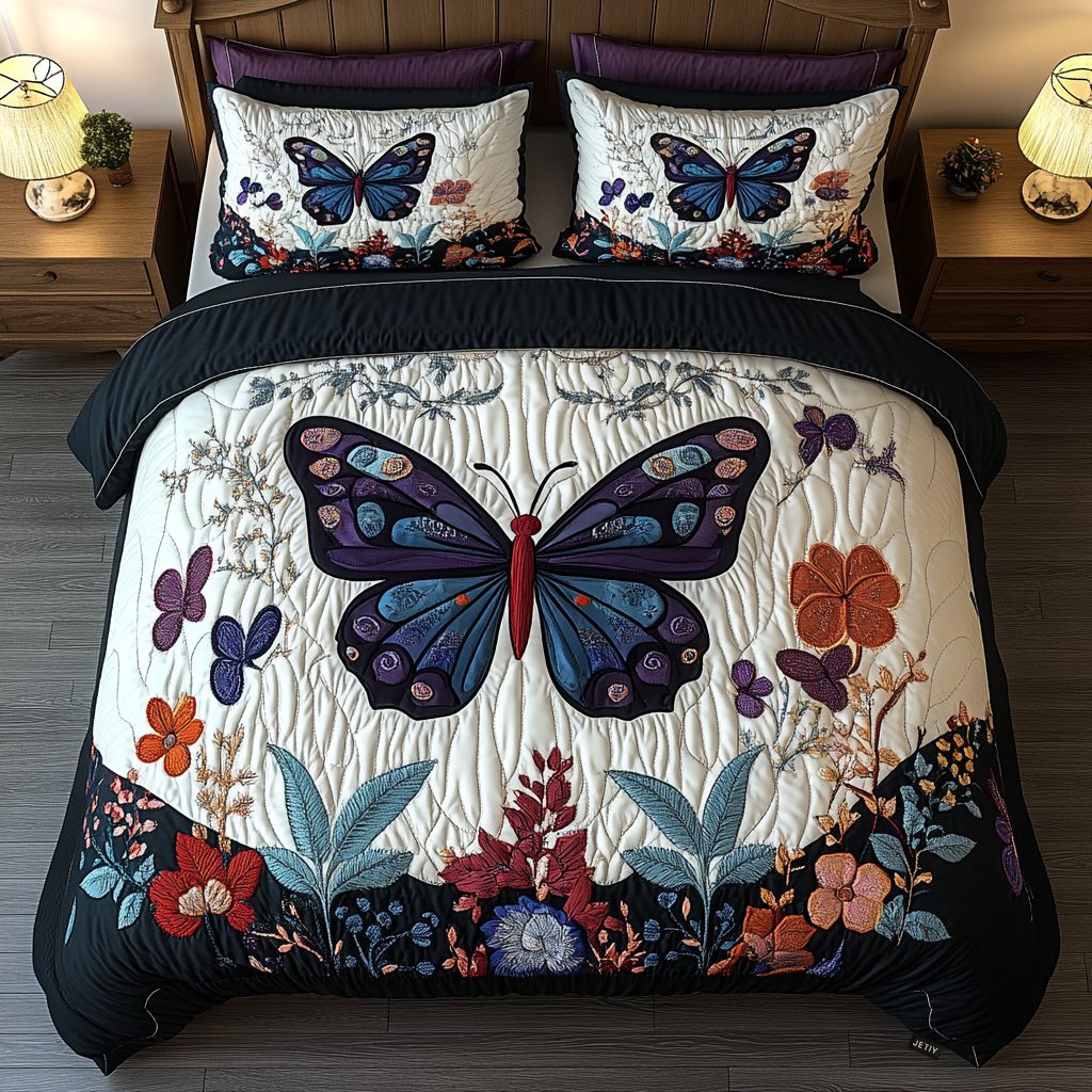Whimsical Wings quilted 3-piece bedding set on a made bed with two matching pillow shams