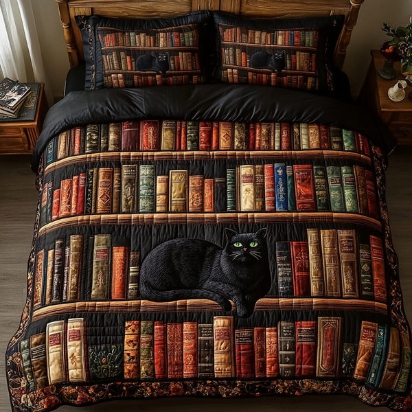 Whiskered Reads quilted 3-piece bedding set on a made bed with two matching pillow shams