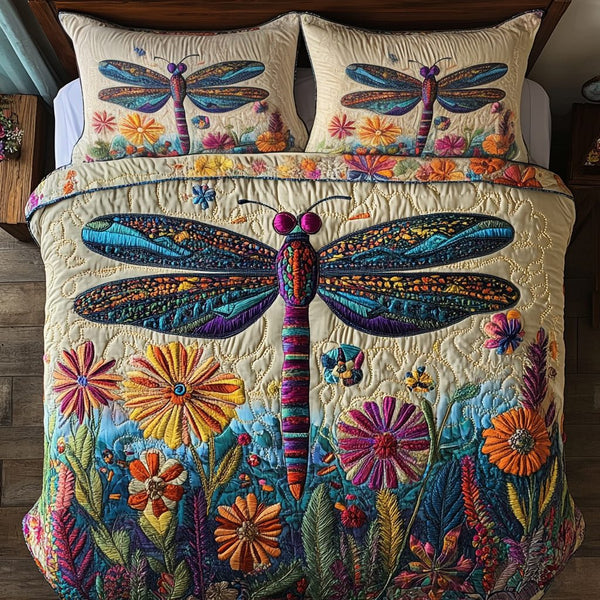 Whispering Flight quilted 3-piece bedding set on a made bed with two matching pillow shams