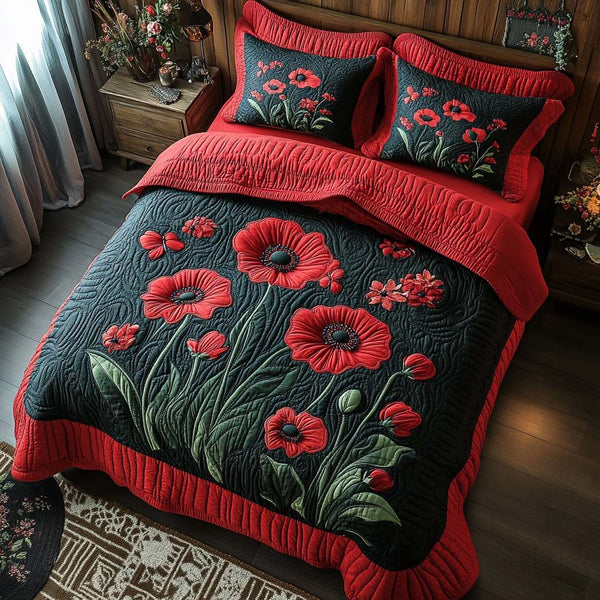 Whispering Poppies quilted 3-piece bedding set on a made bed with two matching pillow shams