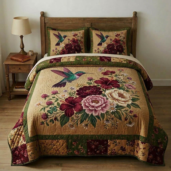 Whispering Sanctuary quilted 3-piece bedding set on a made bed with two matching pillow shams