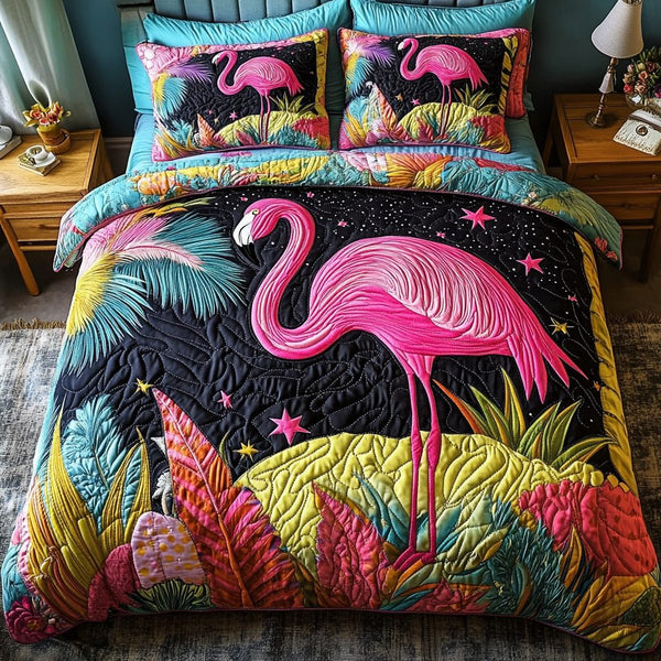 Wild Flamingo quilted 3-piece bedding set on a made bed with two matching pillow shams