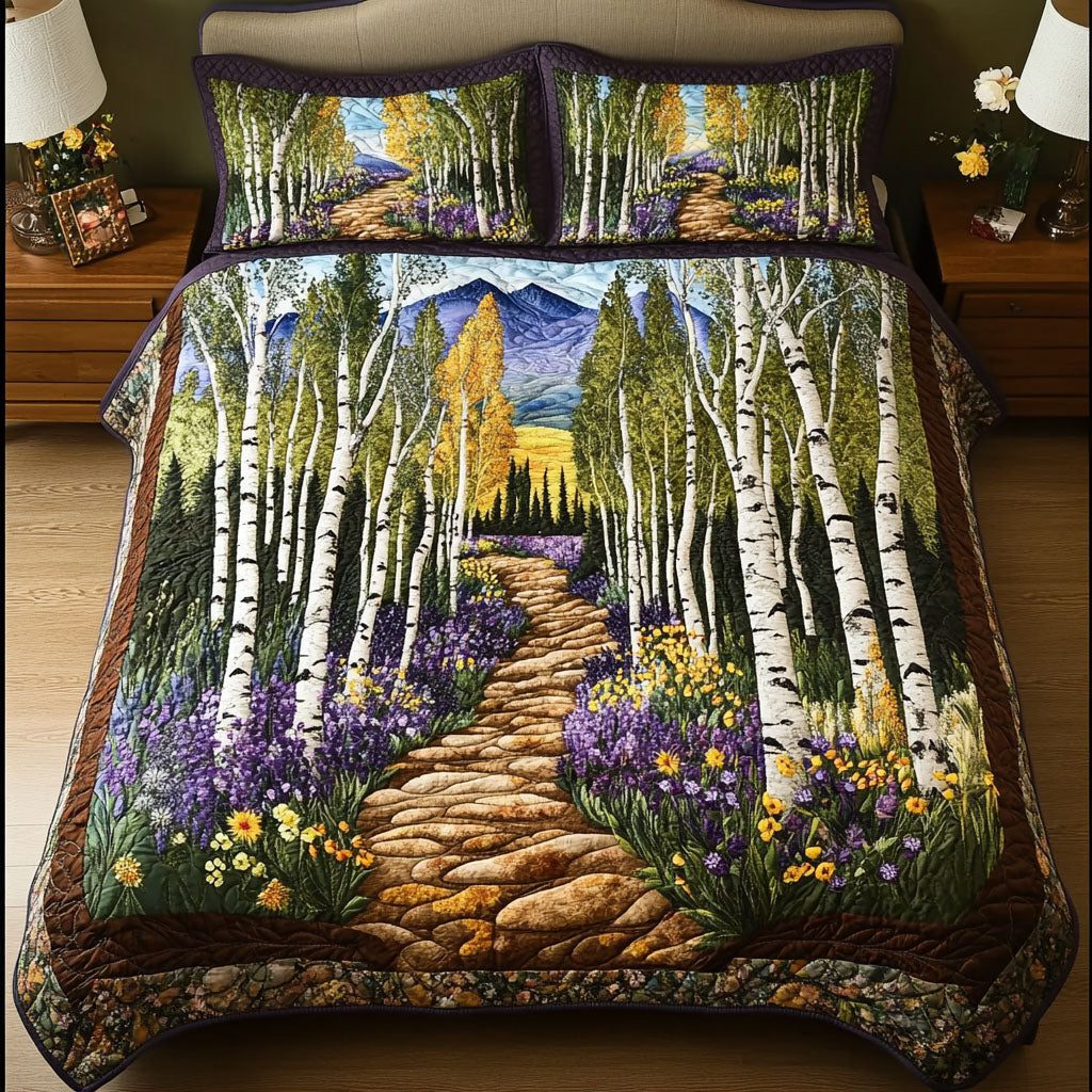 Wildflower Trail quilted 3-piece bedding set on a made bed with two matching pillow shams