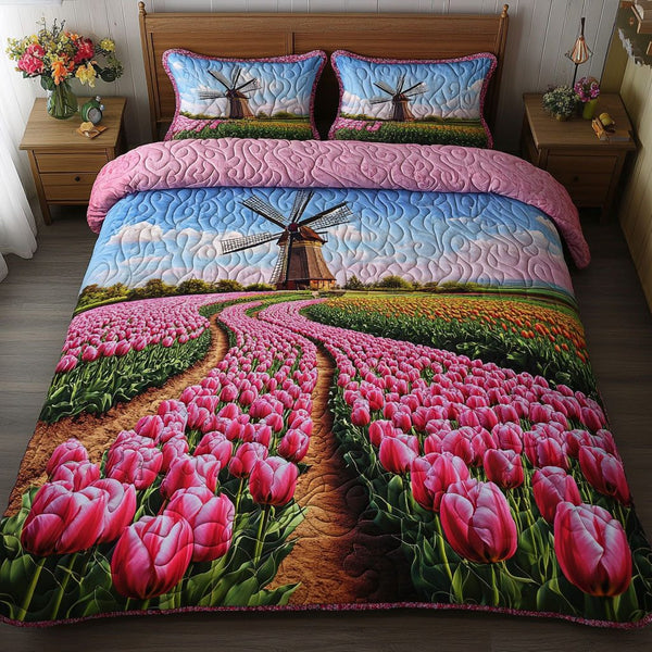 Windmill Petal Road quilted 3-piece bedding set on a made bed with two matching pillow shams