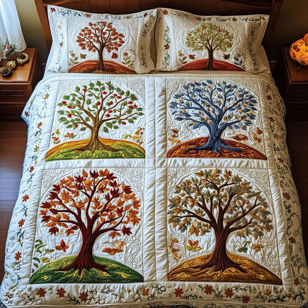 Winds of Renewal quilted 3-piece bedding set on a made bed with two matching pillow shams