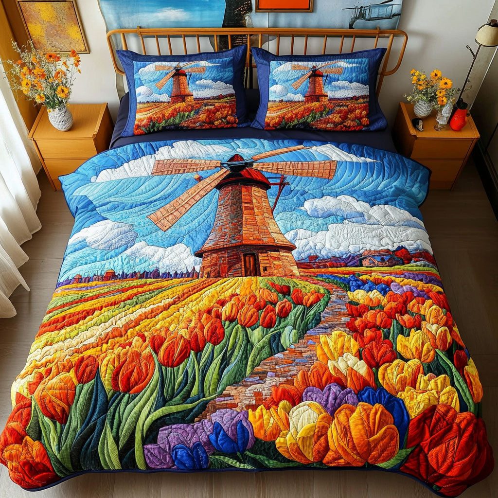 Windswept Blooms quilted 3-piece bedding set on a made bed with two matching pillow shams