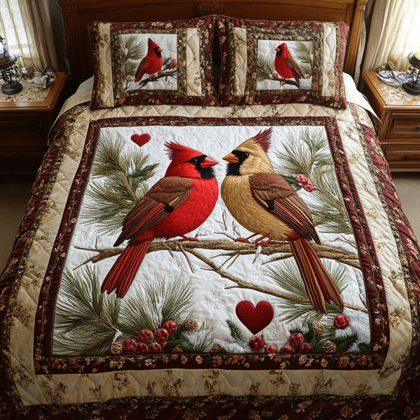 Winged Love quilted 3-piece bedding set on a made bed with two matching pillow shams