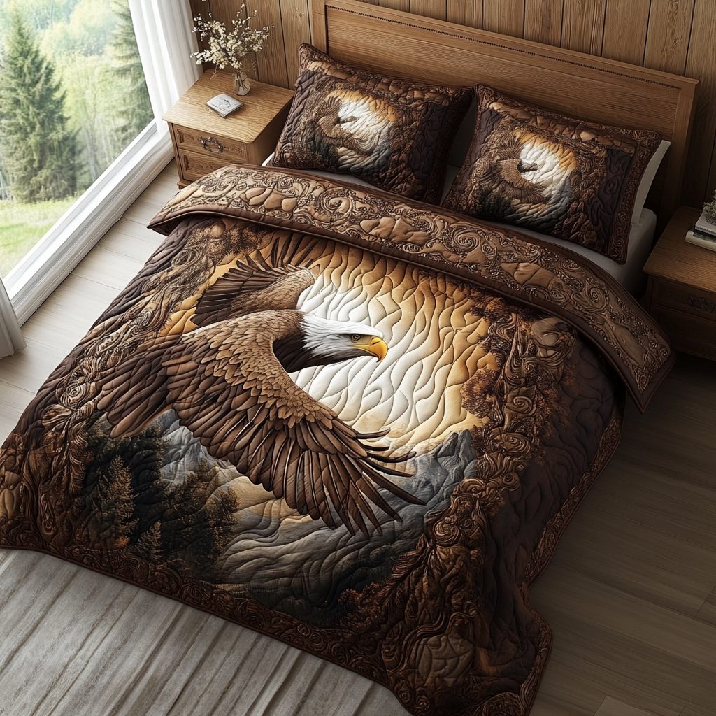 Winged Pride quilted 3-piece bedding set on a made bed with two matching pillow shams