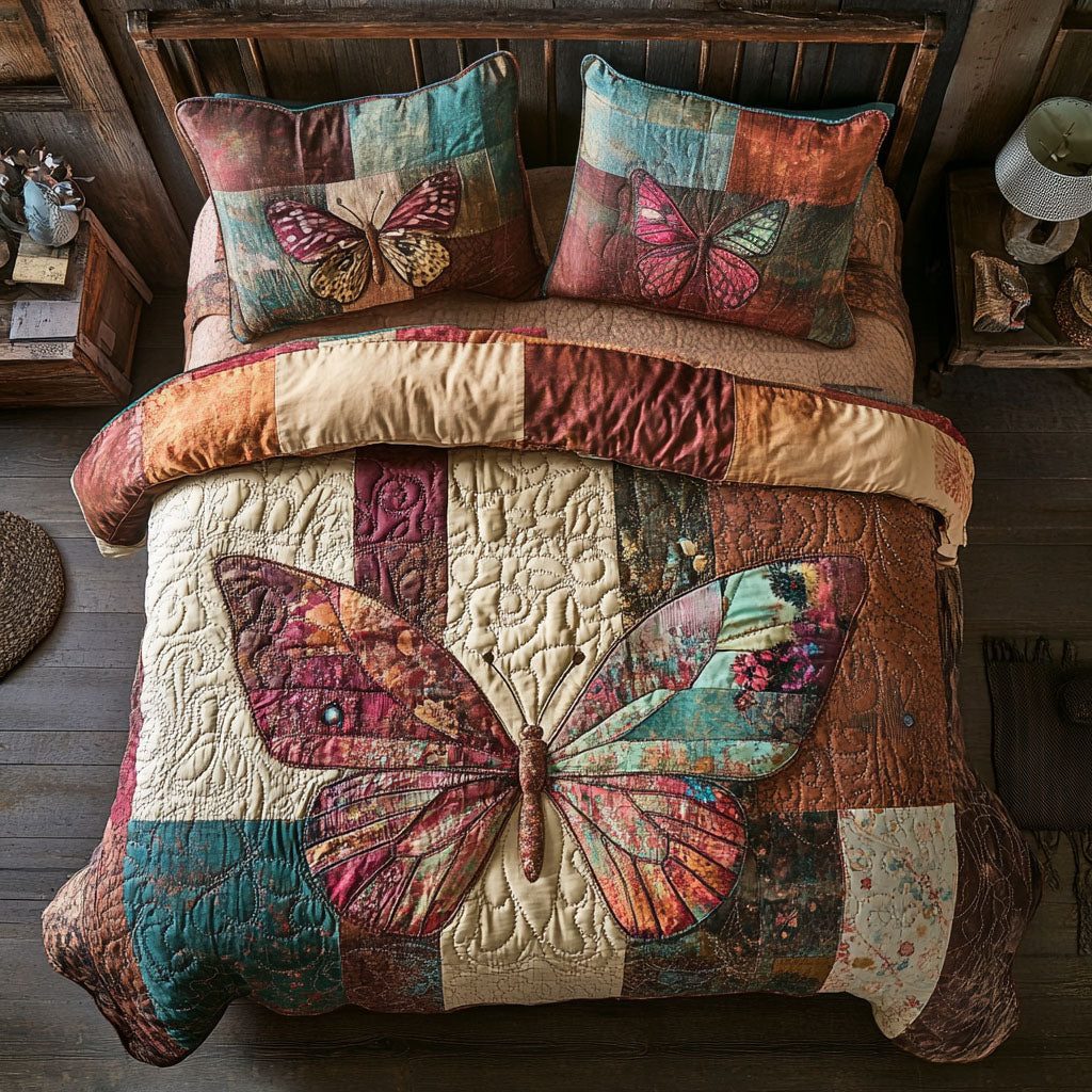Wings of Beauty quilted 3-piece bedding set on a made bed with two matching pillow shams