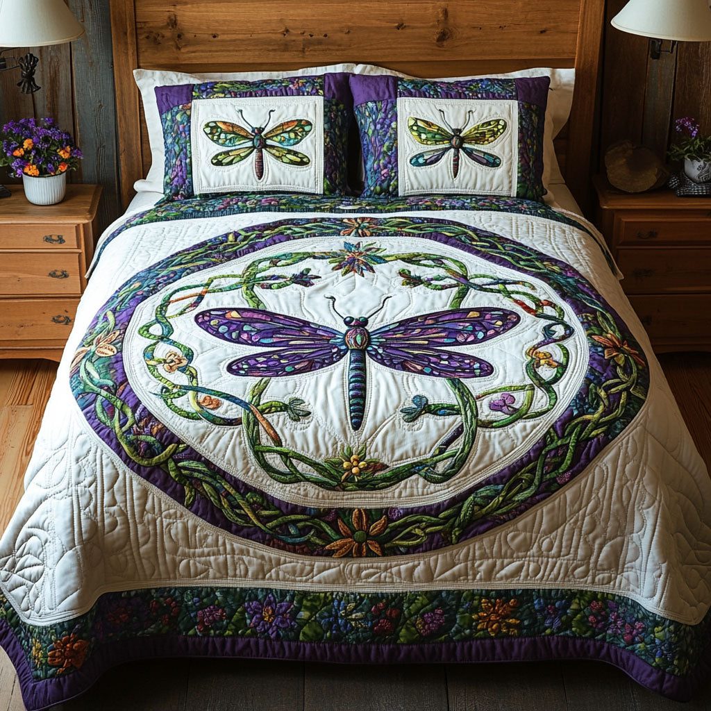 Wings of Eternity quilted 3-piece bedding set on a made bed with two matching pillow shams
