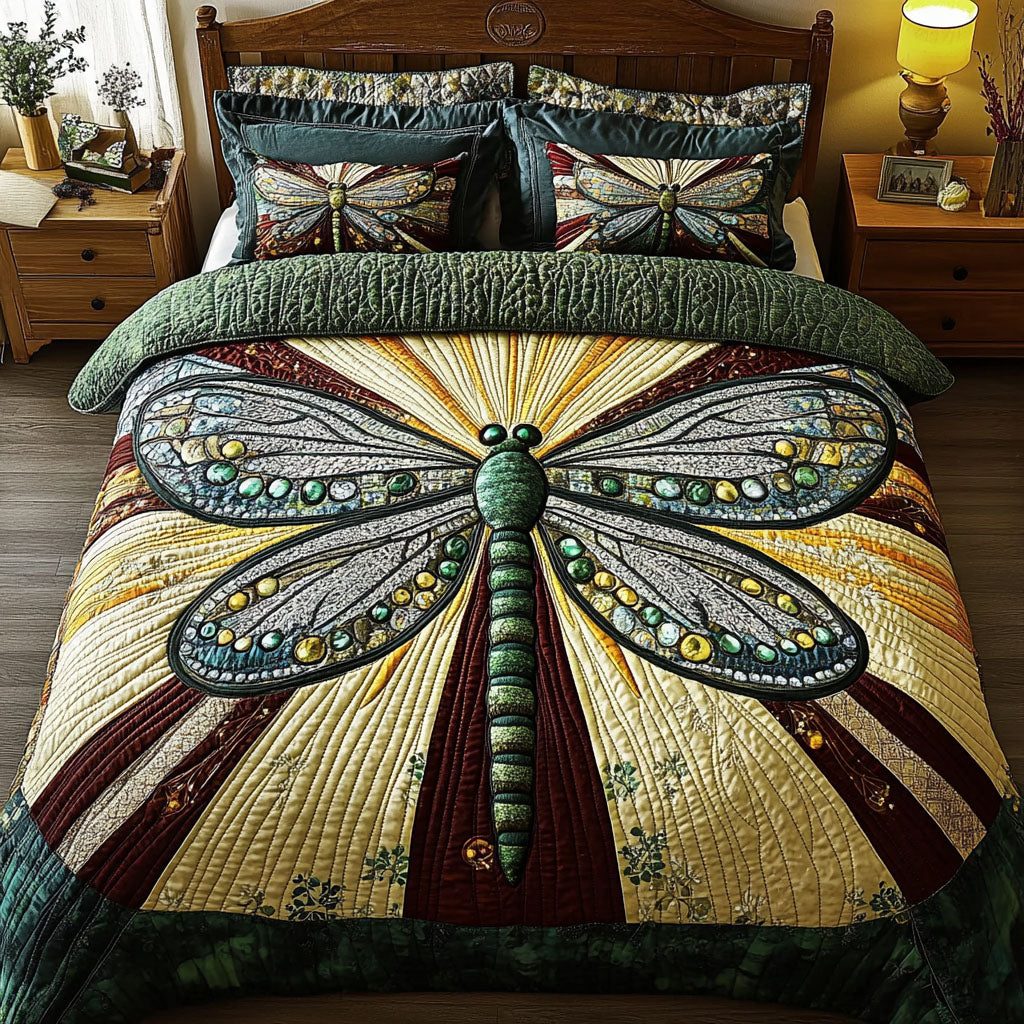 Wings of Legacy quilted 3-piece bedding set on a made bed with two matching pillow shams