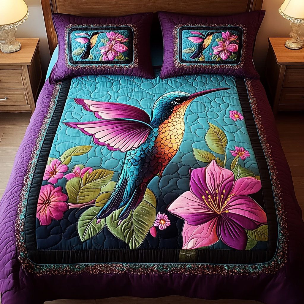 Wings Of Wonder quilted 3-piece bedding set on a made bed with two matching pillow shams