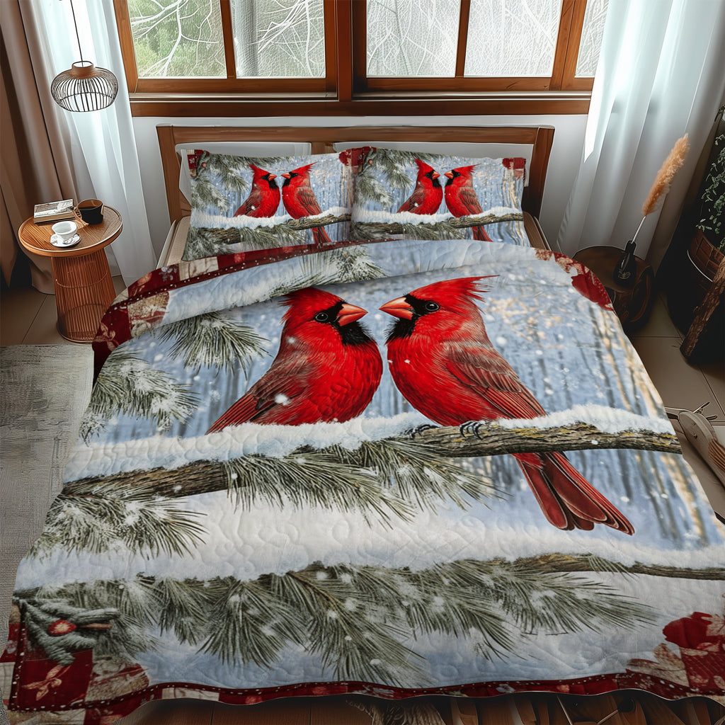Winter Cardinal Bliss quilted 3-piece bedding set on a made bed in a winter-styled bedroom