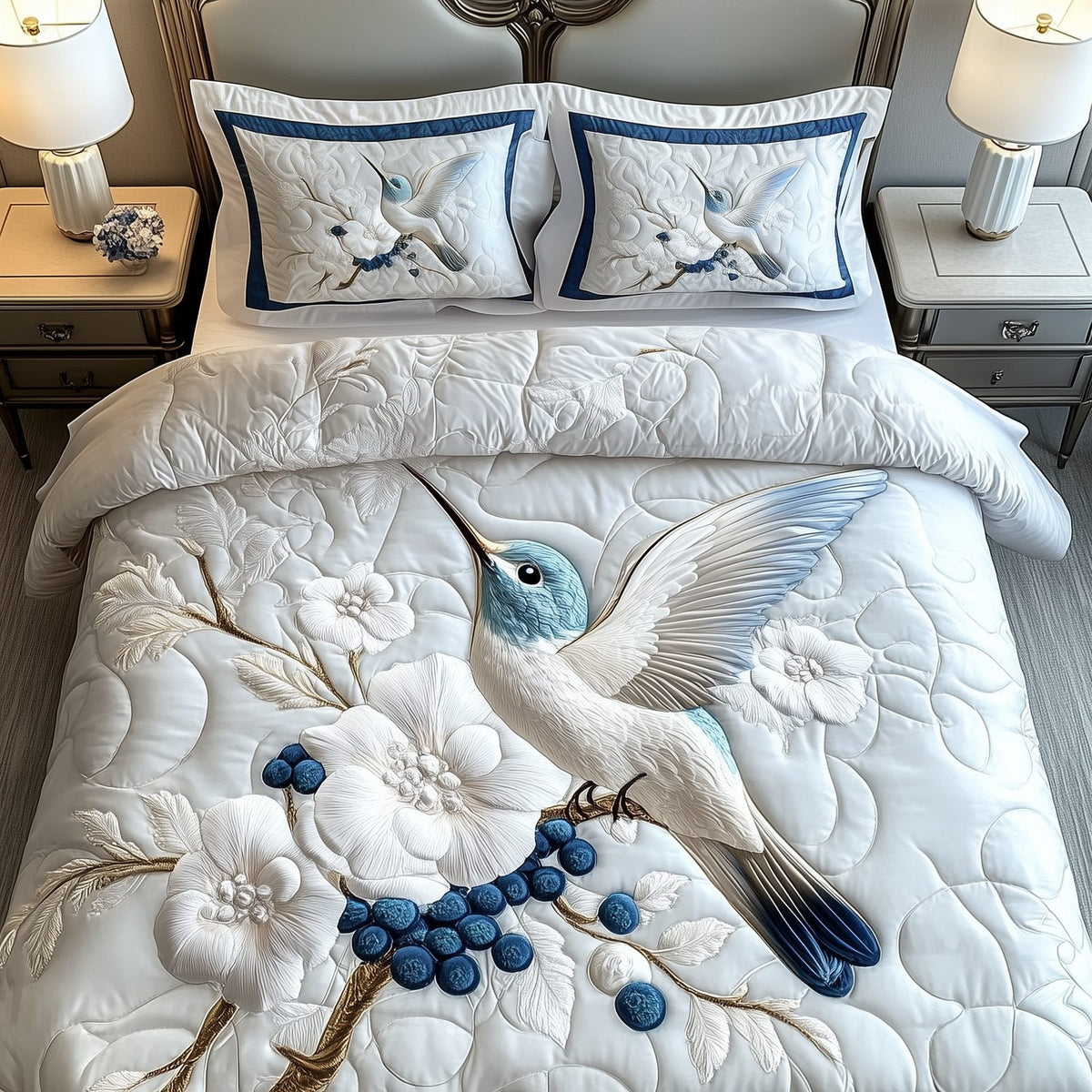 Winter Hummingbird quilted 3-piece bedding set on a made bed in a winter-styled bedroom