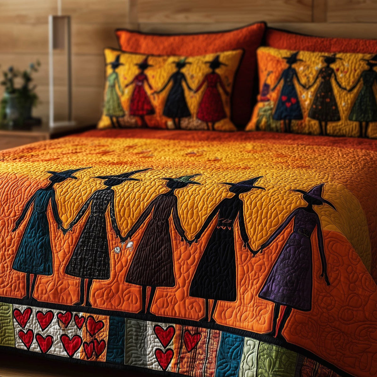 Wisdom Squad quilted 3-piece bedding set on a made bed with two matching pillow shams