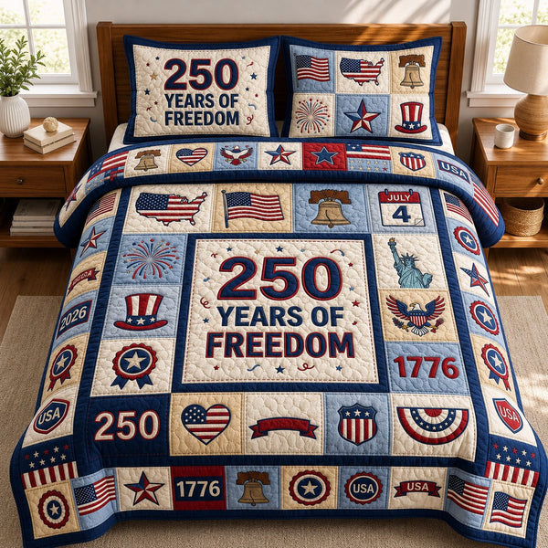250 Years Of Freedom quilted 3-piece bedding set on a made bed in a warmly lit bedroom