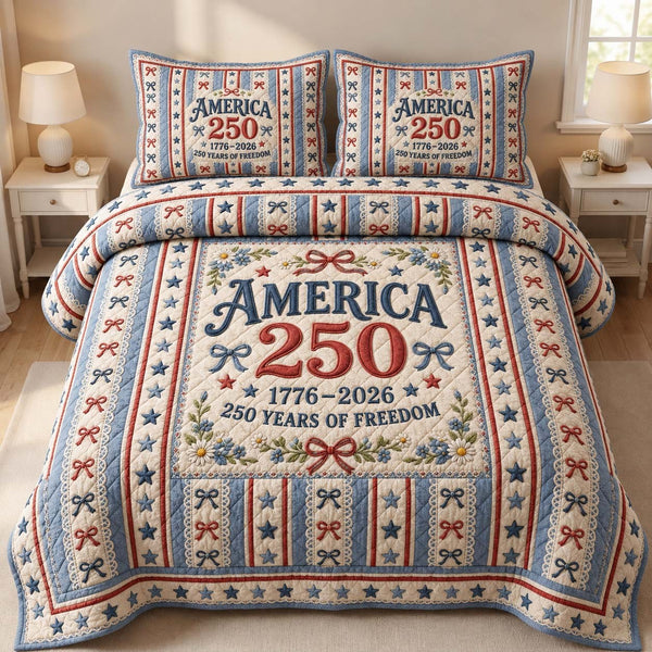America 250 Floral quilted 3-piece bedding set on a made bed in a warmly lit bedroom