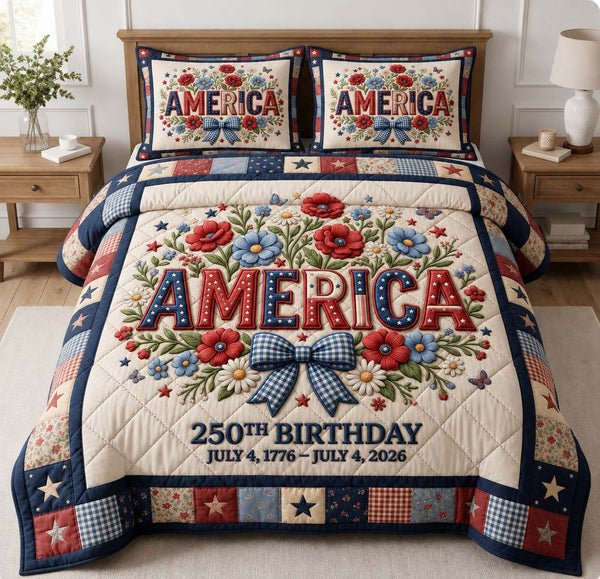 America 250 Floral quilted 3-piece bedding set on a made bed in a warmly lit bedroom