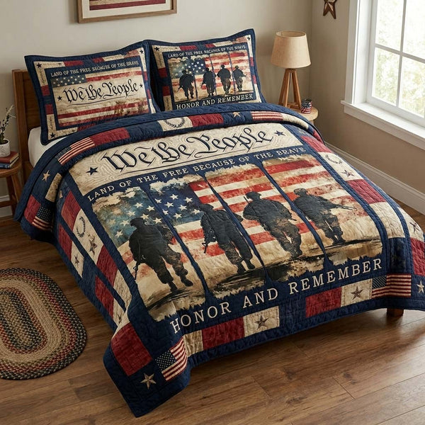 Brave Honor quilted 3-piece bedding set on a made bed in a warmly lit bedroom