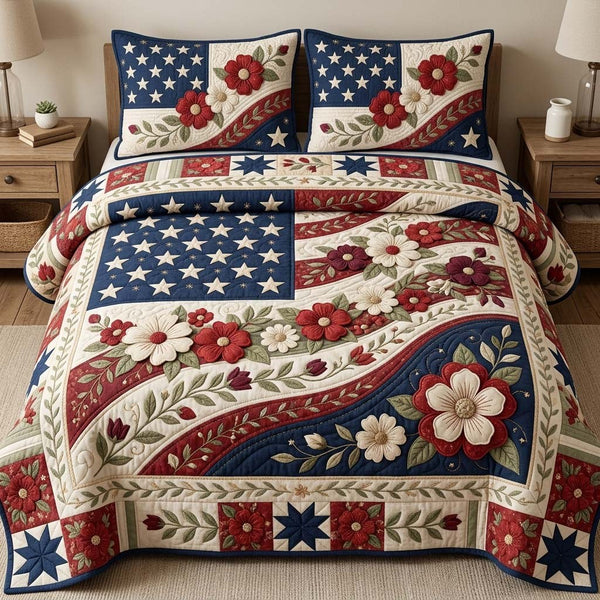 Americana Garden quilted 3-piece bedding set on a made bed in a warmly lit bedroom