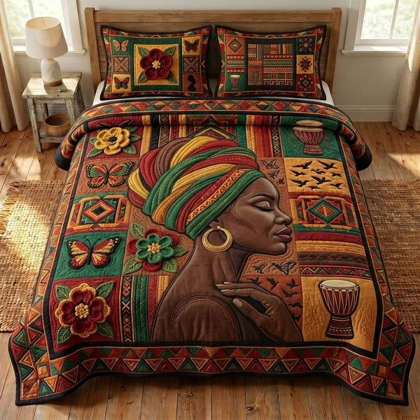 Afro Bloom quilted 3-piece bedding set on a made bed with two matching pillow shams