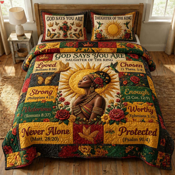 Daughter of the King quilted 3-piece bedding set on a made bed with two matching pillow shams