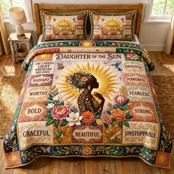Daughter of the Sun quilted 3-piece bedding set on a made bed with two matching pillow shams