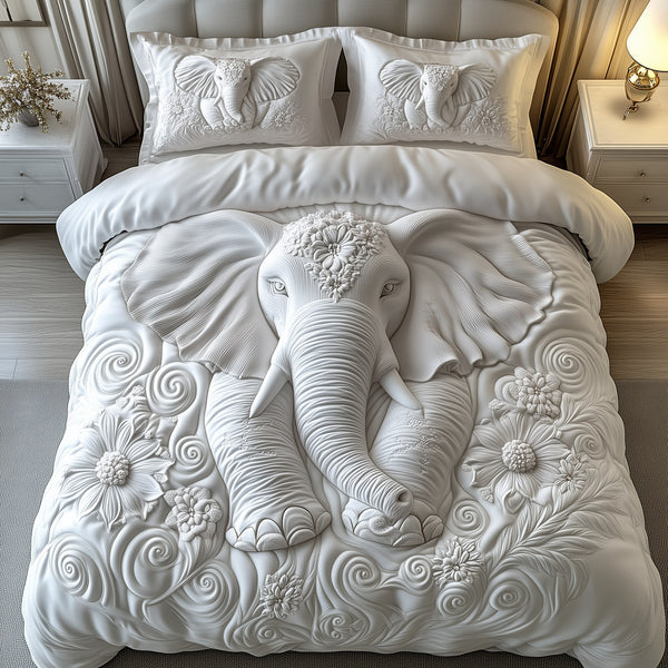 Elegant Elephant quilted 3-piece bedding set on a made bed with two matching pillow shams